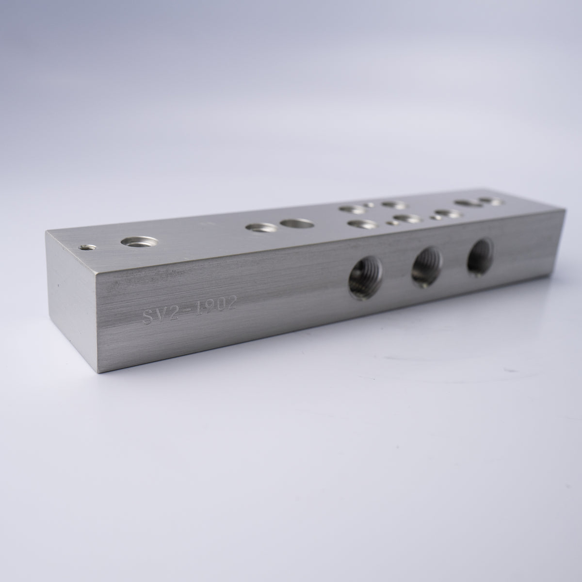 SV2-1902 MANIFOLD (4-WAY,SIDE PORT) - Mathers Controls